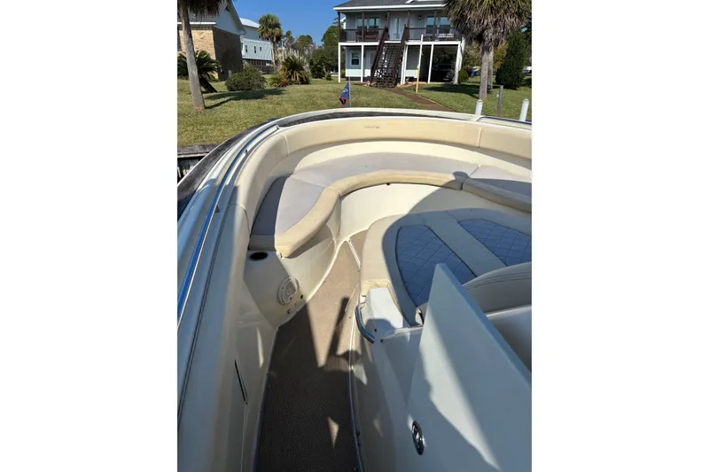 Slide: The Image of 2018 Chris-Craft 350 Catalina boat interior with cushioned seating and elegant design. - 23