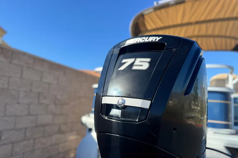 Slide: The Image of Mercury 75 horsepower engine on 2023 Sun Tracker Bass Buggy 18 DLX boat. - 8