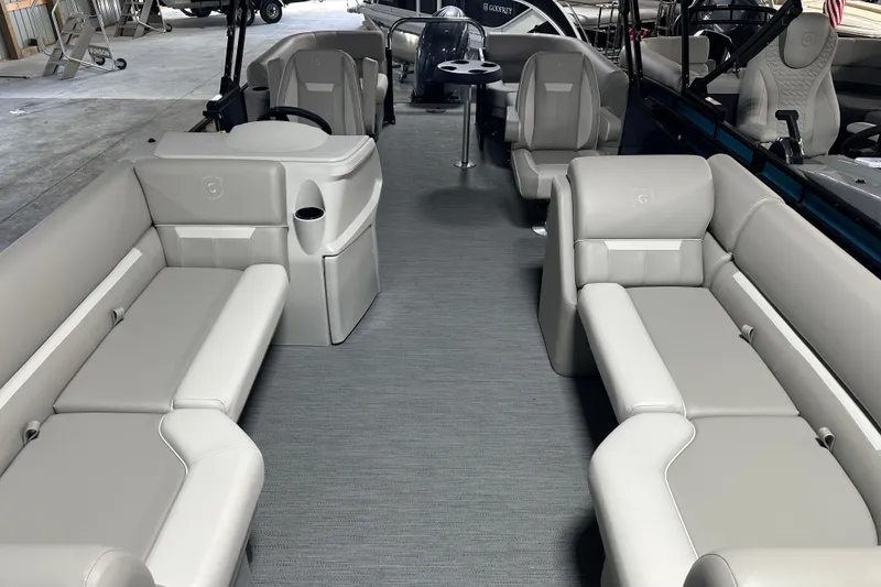 Slide: The Image of 2026 Godfrey Xperience 2286 SBX pontoon boat interior with spacious seating and modern design. - 11