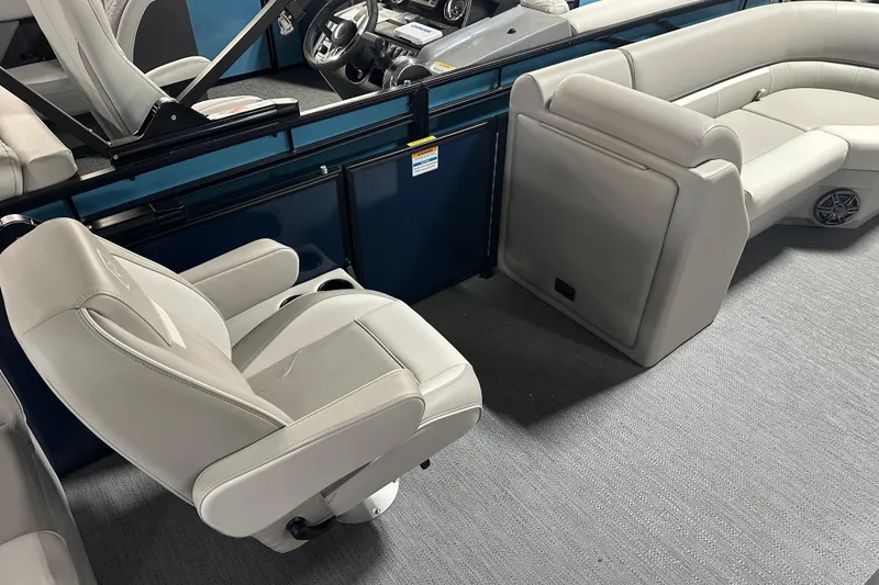 Slide: The Image of 2026 Godfrey Xperience 2286 SBX boat interior with plush seating and modern design. - 8