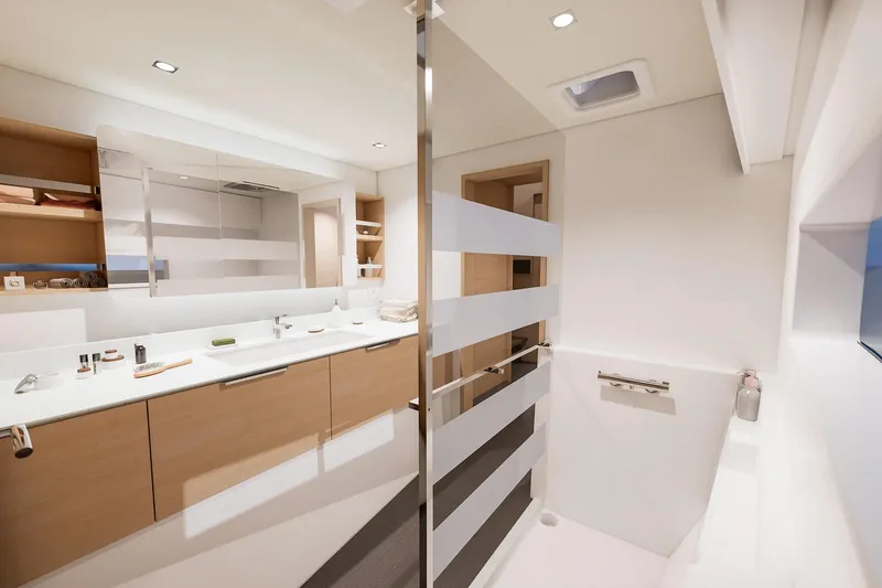 Slide: The Image of Luxurious bathroom interior of 2026 Fountaine Pajot 48 yacht, featuring modern design and amenities. - 2