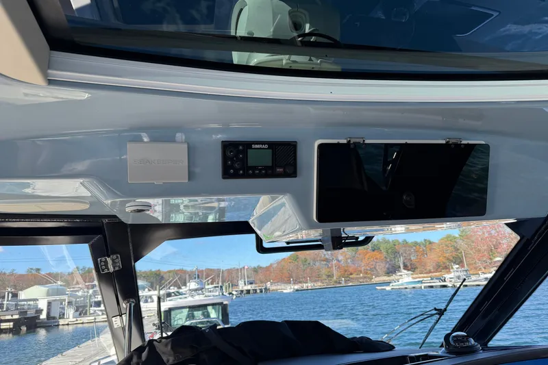 Slide: The Image of Interior view of 2024 Boston Whaler 380 Realm boat with navigation equipment. - 9
