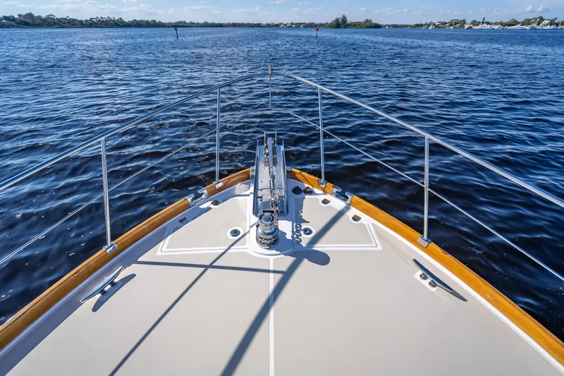 Slide: The Image of Bow view of 2008 Grand Banks 47 Eastbay FB yacht on open water. - 18