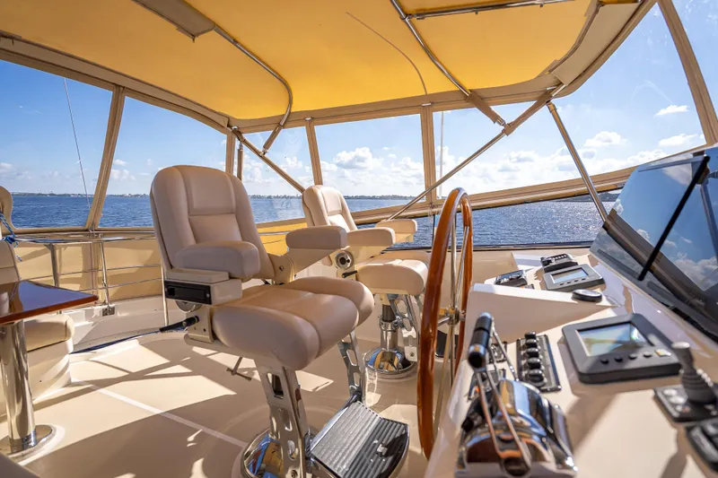 Slide: The Image of Luxurious helm of 2008 Grand Banks 47 Eastbay FB yacht with ocean view. - 2