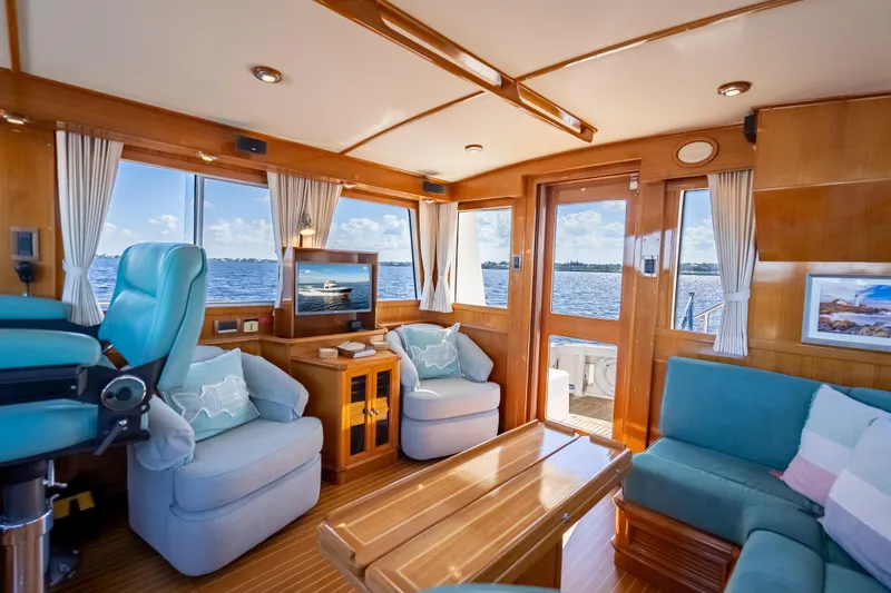 Slide: The Image of Luxurious interior of 2008 Grand Banks 47 Eastbay FB yacht with ocean view. - 3