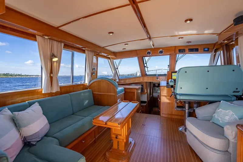 Slide: The Image of Luxurious 2008 Grand Banks 47 Eastbay FB yacht interior with elegant wood finish and comfortable seating. - 31