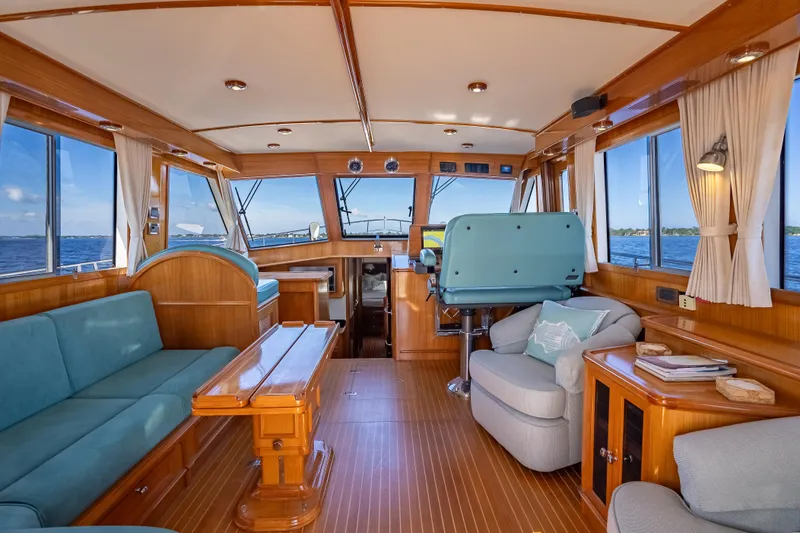 Slide: The Image of Luxurious 2008 Grand Banks 47 Eastbay FB yacht interior with elegant wood finish and comfortable seating. - 32