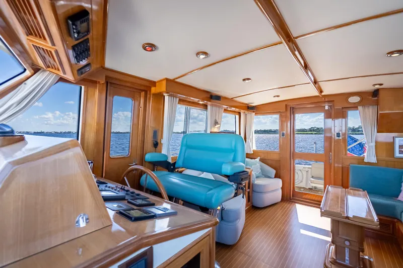 Slide: The Image of Luxurious 2008 Grand Banks 47 Eastbay FB yacht interior with wood finish and ocean view. - 34