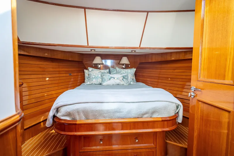 Slide: The Image of Luxurious cabin interior of 2008 Grand Banks 47 Eastbay FB yacht with cozy bedding. - 46