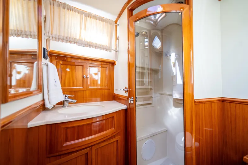 Slide: The Image of Luxurious wooden bathroom interior on 2008 Grand Banks 47 Eastbay FB yacht. - 48