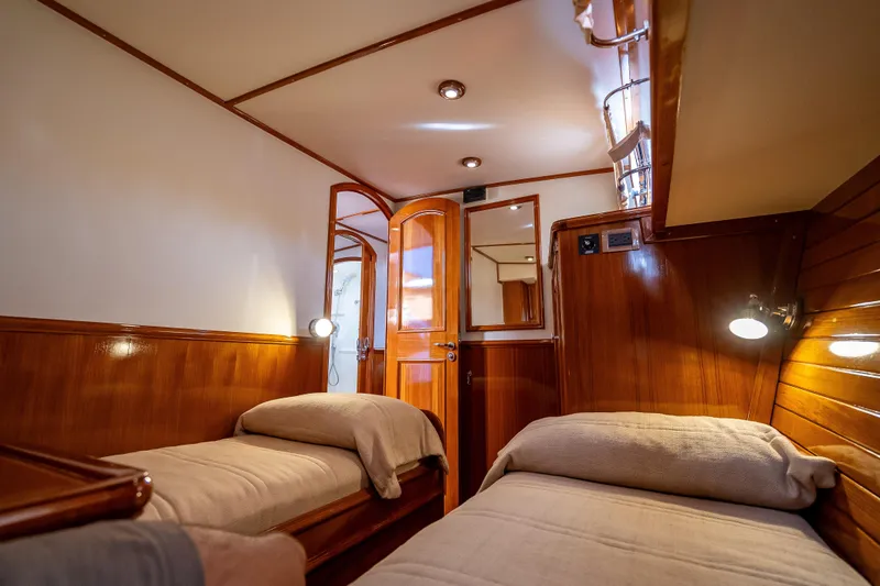 Slide: The Image of Luxurious wooden cabin interior of 2008 Grand Banks 47 Eastbay FB yacht. - 53