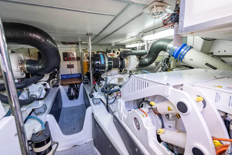 Slide: The Image of Engine room of 2008 Grand Banks 47 Eastbay FB, showcasing mechanical components and systems. - 58