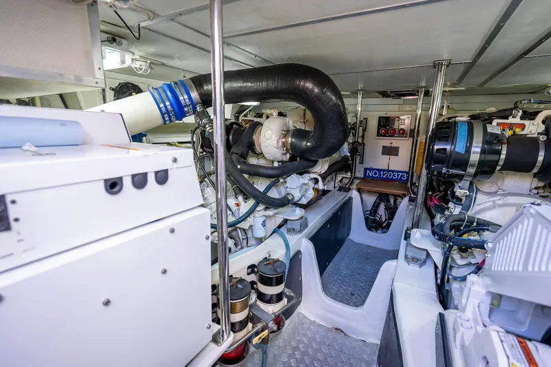 Slide: The Image of Engine room of 2008 Grand Banks 47 Eastbay FB yacht, showcasing machinery and equipment. - 63