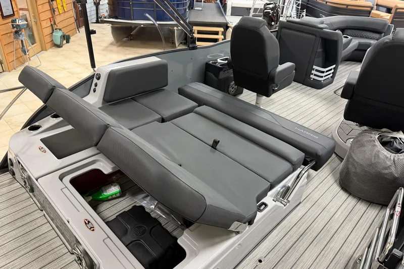 Slide: The Image of 2026 Harris Grand Mariner 250 interior with luxurious seating and modern design. - 14