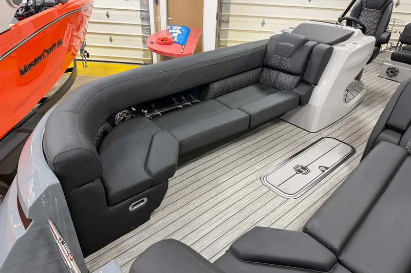 Slide: The Image of 2026 Harris Grand Mariner 250 interior with luxurious seating and modern design. - 4