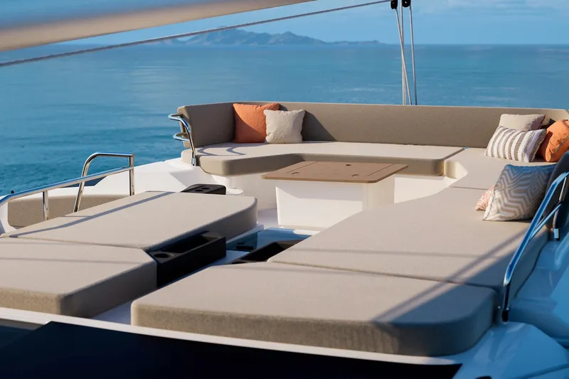Slide: The Image of Luxurious 2026 Fountaine Pajot 48 yacht deck with elegant seating and ocean view. - 24