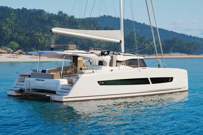 Slide: The Image of 2026 Fountaine Pajot 48 catamaran sailing near tropical beach, showcasing luxury design. - 38