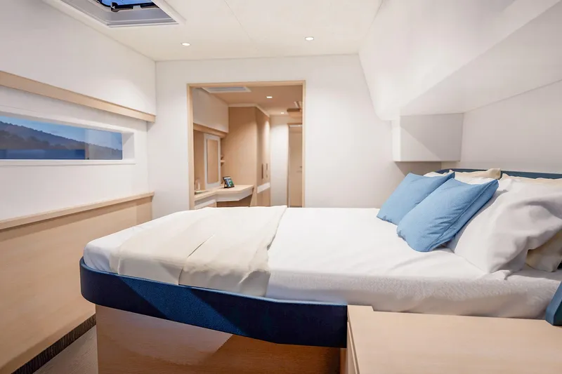 Slide: The Image of Luxurious bedroom interior of 2026 Fountaine Pajot 48 yacht with modern design. - 5