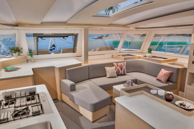 Slide: The Image of Luxurious interior of 2026 Fountaine Pajot 48 catamaran with modern design and panoramic windows. - 8