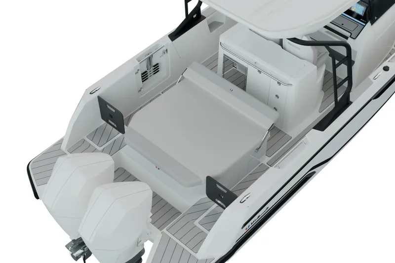 Slide: The Image of 2026 Wellcraft 28 T-Top boat on serene ocean with scenic mountain backdrop. - 2