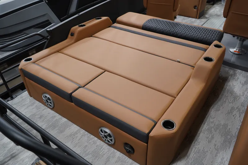 Slide: The Image of Sylvan L-3 ULZ 2026 boat lounger with speakers and cup holders. - 9