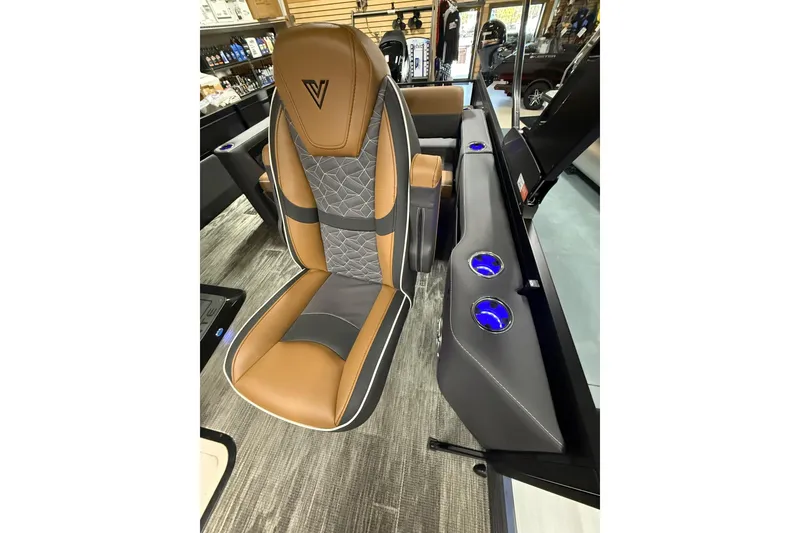 Slide: The Image of Luxurious Viaggio Diamante 24S 2026 boat seat with elegant design and blue LED cup holders. - 21