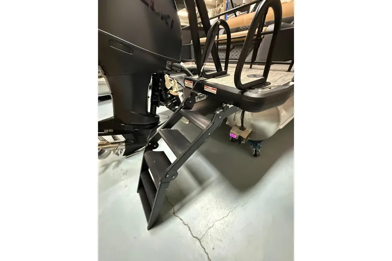 Slide: The Image of 2026 Viaggio Diamante 24S boat with rear ladder and motor detail. - 28