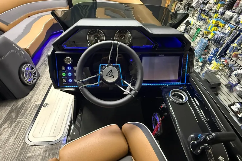 Slide: The Image of 2026 Viaggio Diamante 24S boat dashboard with modern controls and illuminated display. - 6