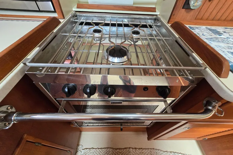 Slide: The Image of Stainless steel stove in 2001 Island Packet 420 yacht kitchen. - 33