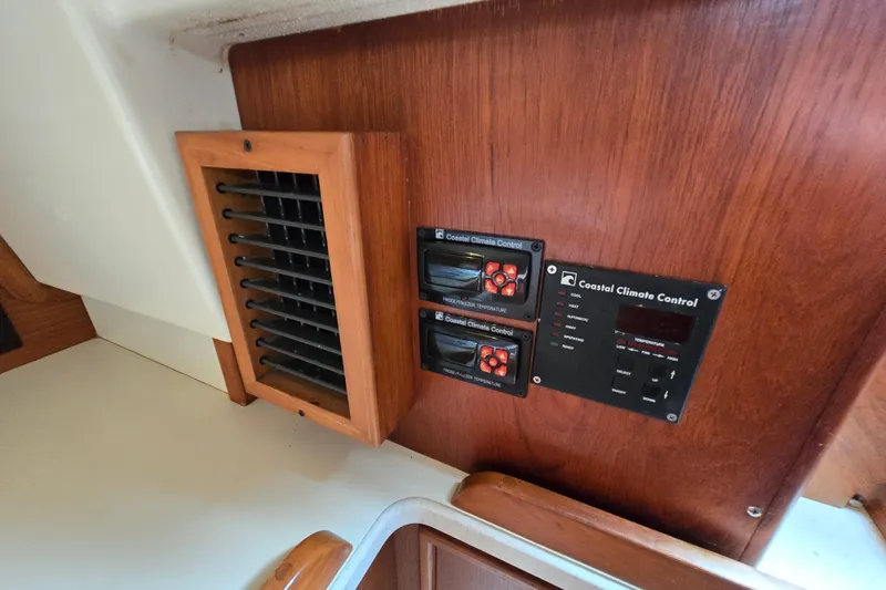 Slide: The Image of Coastal Climate Control panel in 2001 Island Packet 420 yacht interior. - 38