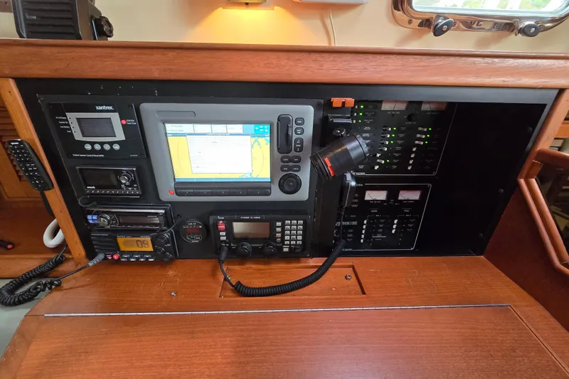 Slide: The Image of Navigation and control panel of a 2001 Island Packet 420 sailboat. - 46