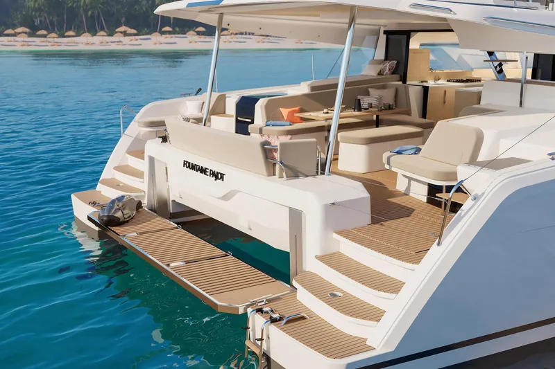 Slide: The Image of Luxury Fountaine Pajot 48 yacht, 2026 model, docked by a tropical beach. - 22