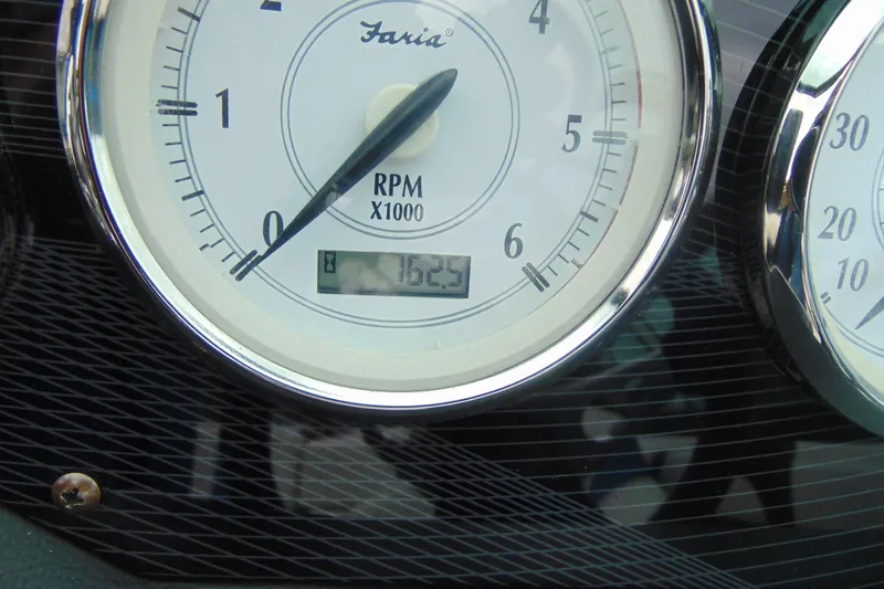 Slide: The Image of Close-up of 2016 Regal 2000 ESX Bowrider tachometer showing 162.5 hours. - 13