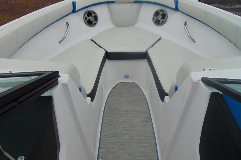 Slide: The Image of 2016 Regal 2000 ESX Bowrider interior with white seating and blue accents. - 14