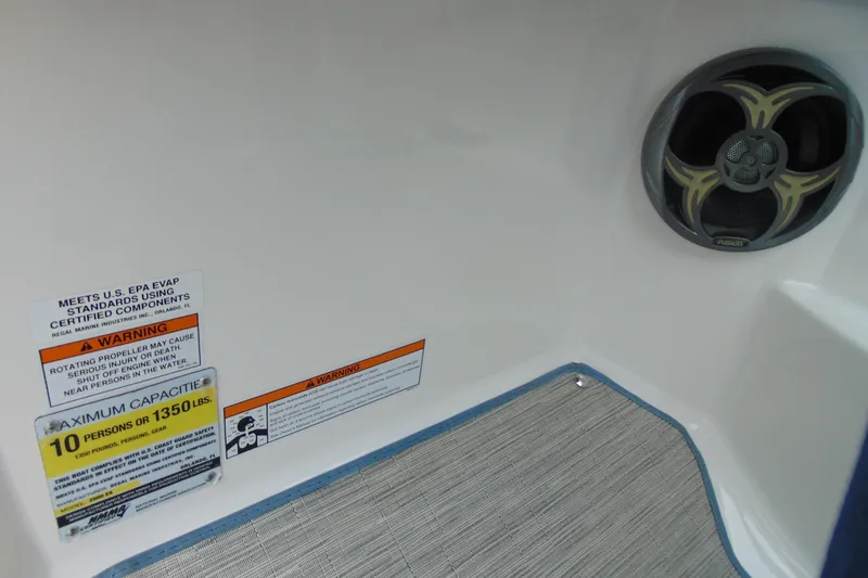 Slide: The Image of 2016 Regal 2000 ESX Bowrider interior with safety warnings and speaker detail. - 15