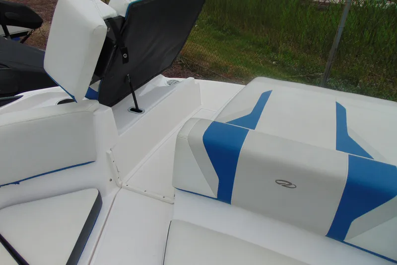 Slide: The Image of 2016 Regal 2000 ESX Bowrider interior with white and blue seating. - 19