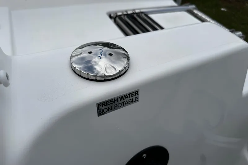 Slide: The Image of 2026 Sea Pro 240 Dual Console boat with non-potable fresh water cap. - 25