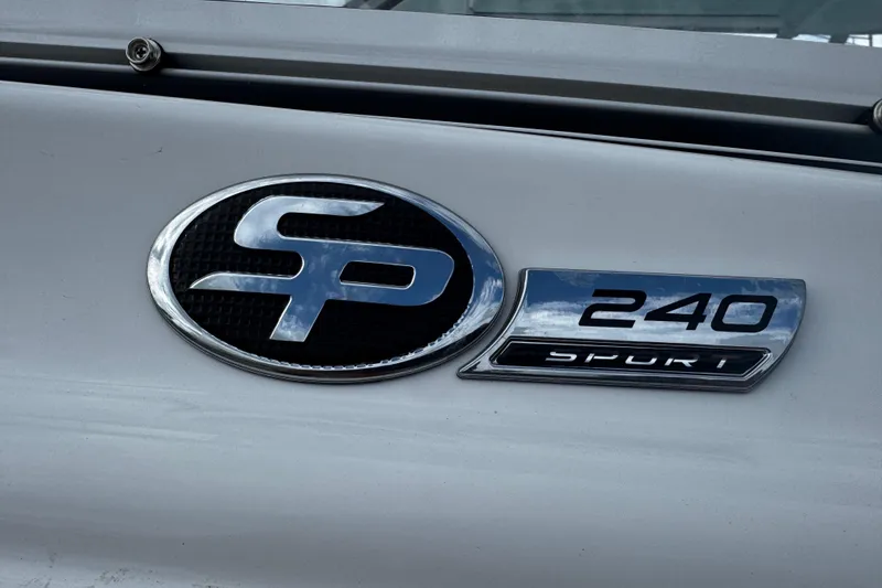 Slide: The Image of 2026 Sea Pro 240 Dual Console emblem on boat exterior. - 3