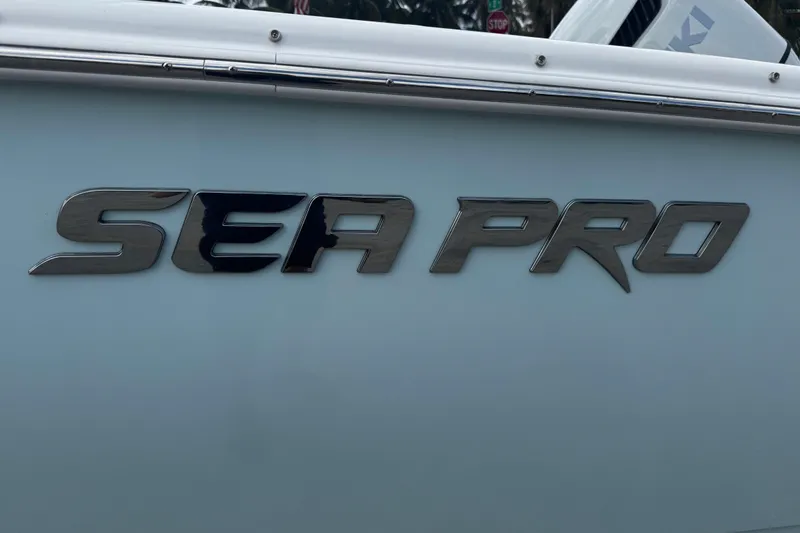 Slide: The Image of Sea Pro 240 Dual Console 2026 boat logo on hull. - 36