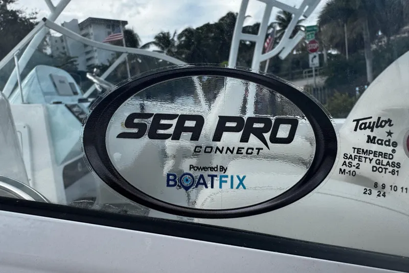 Slide: The Image of Sticker on 2026 Sea Pro 240 Dual Console boat, featuring Sea Pro Connect and BoatFix logos. - 37