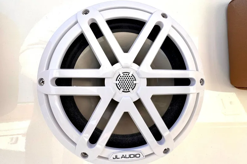 Slide: The Image of White JL Audio speaker on 2026 Key West 239 FSR boat. - 12