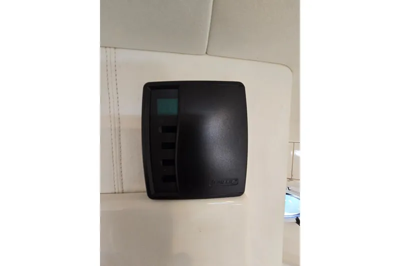 Slide: The Image of Black control panel on Giorgi 46 yacht, model year 1993, mounted on white interior wall. - 121