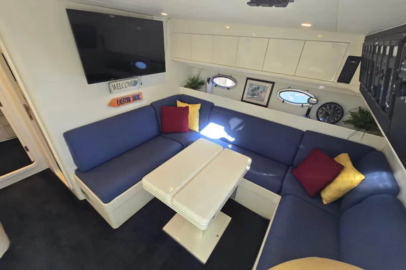 Slide: The Image of Luxurious interior of 1993 Giorgi 46 yacht with blue seating and modern decor. - 99