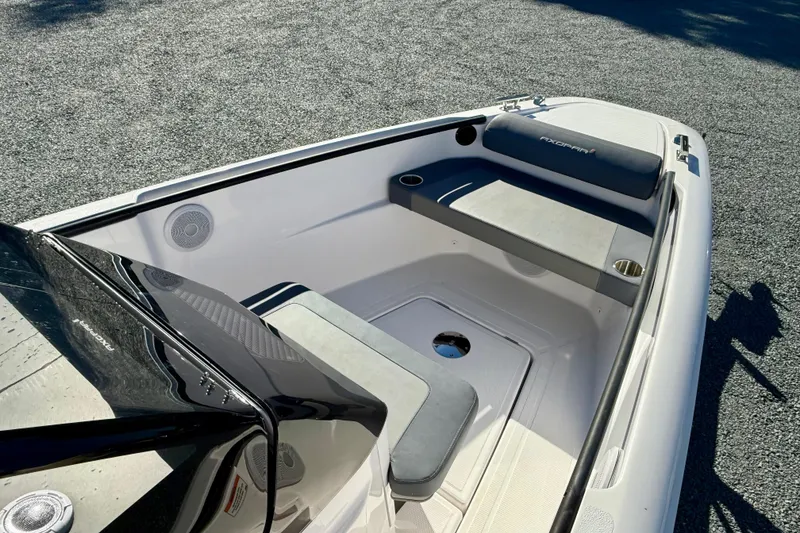 Slide: The Image of 2022 Axopar 22 boat interior with seating and cup holders. - 27
