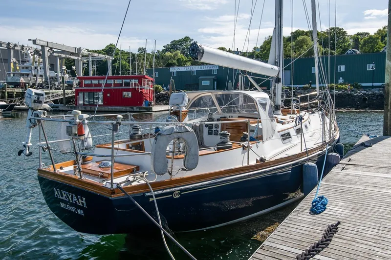 Slide: The Image of Sailboat docked at marina, Hank Hinckley OC42, 1984 model, sunny day. - 10