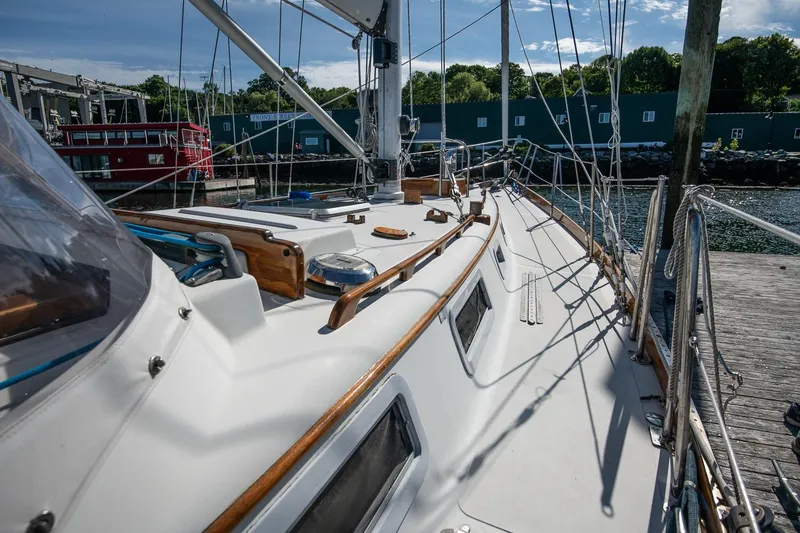 Slide: The Image of Sailboat docked at marina, Hank Hinckley OC42, 1984 model, sunny day. - 12