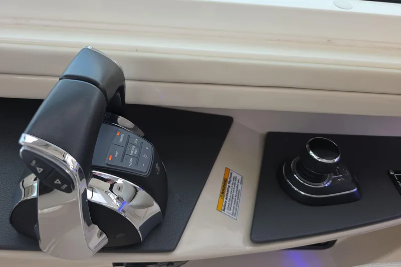 Slide: The Image of Control panel of 2018 Boston Whaler 320 Vantage boat with throttle and joystick. - 12