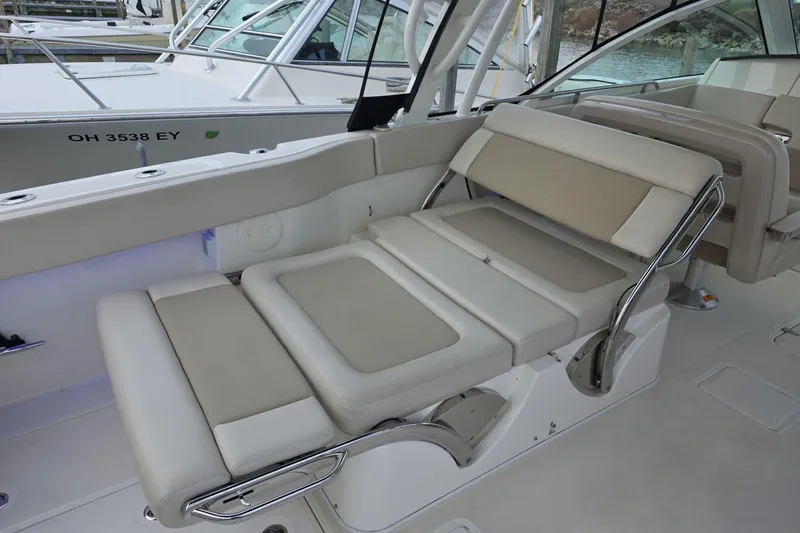 Slide: The Image of 2018 Boston Whaler 320 Vantage boat interior with adjustable seating and sleek design. - 26