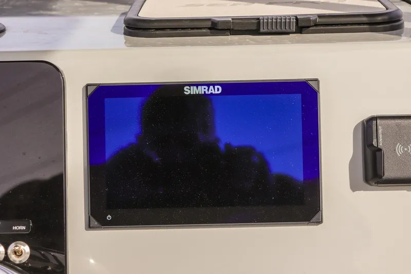 Slide: The Image of Simrad display on 2026 Sea Pro 230 Bay boat dashboard. - 28