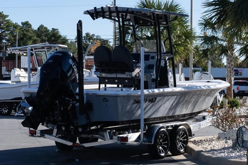 Slide: The Image of 2026 Sea Pro 230 Bay boat on trailer at dealership lot. - 6
